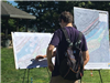 Two People Viewing Community Plans on Greenway for a Day