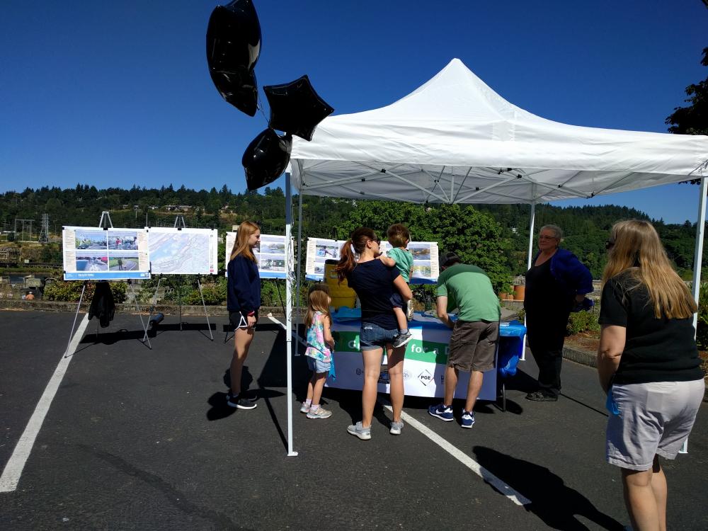 Greenway for a Day - Adults and Children at a Booth