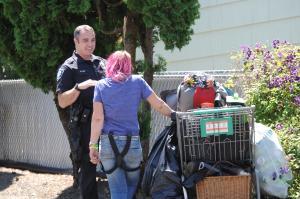 Homeless Liaison Officer Talking to Woman