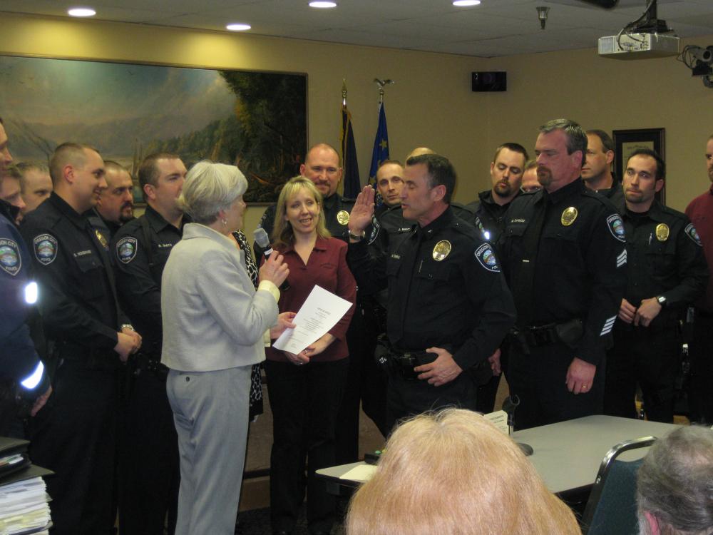 Large Group of People in Formal Wear or Police Outfits